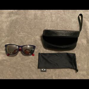 Women’s Oakley sunglasses, bag, and soft case.